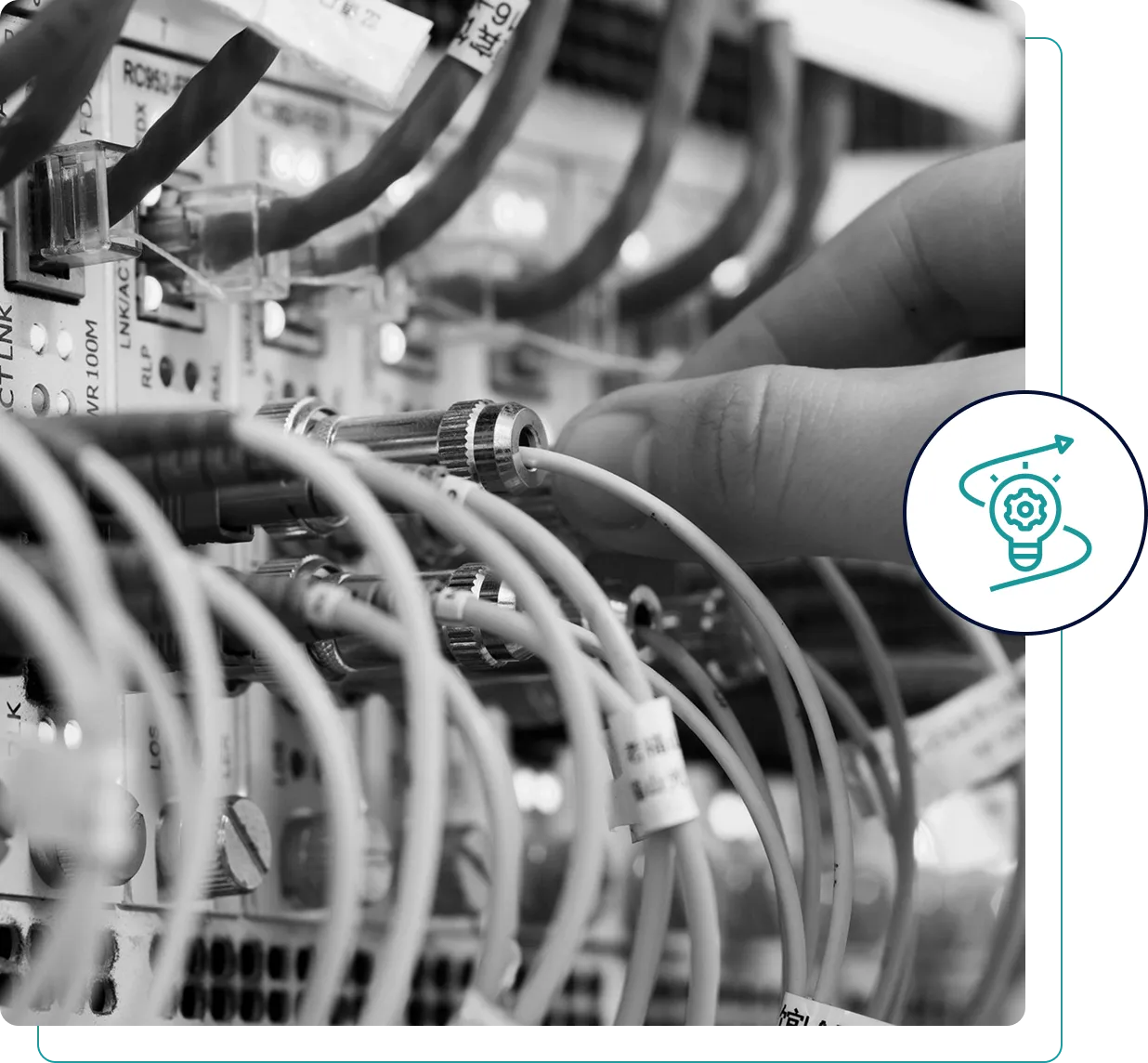 Technician managing network cables in a server room.