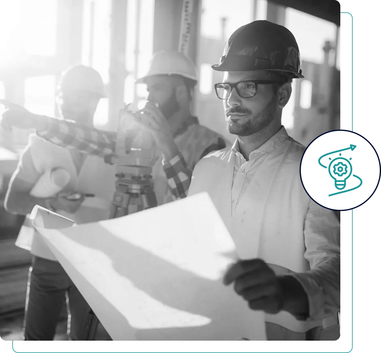 Engineer reviewing blueprints on a construction site.