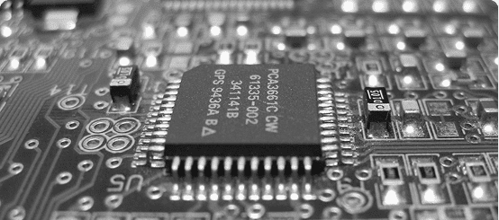 Close-up of a microchip on a circuit board.
